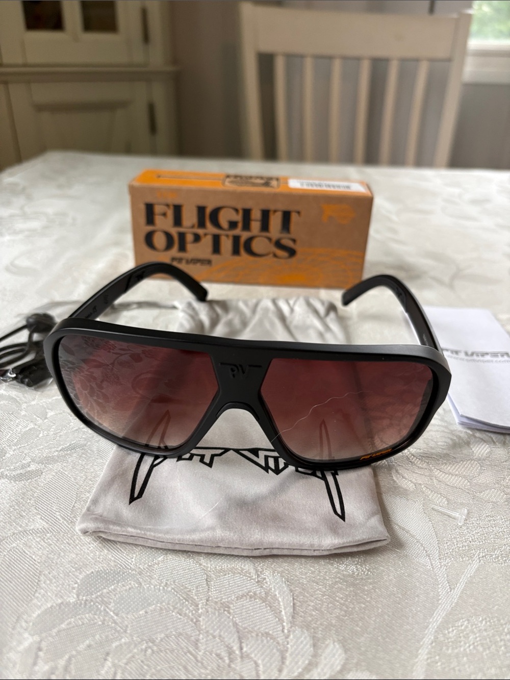 Pit Viper Black Frame Sunglasses with Red Gradient Lenses